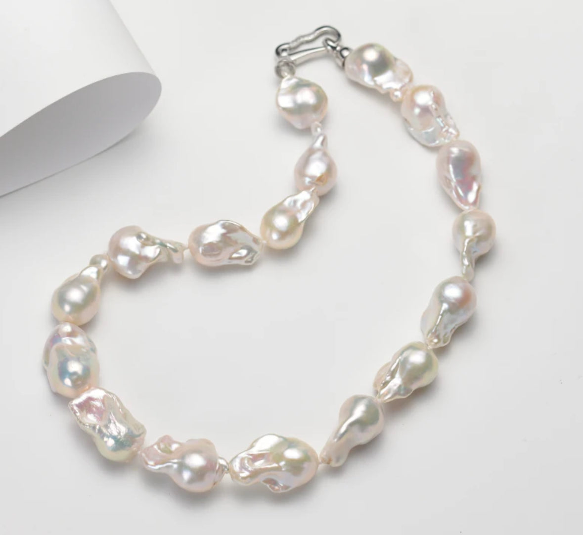 Natural iridescent large Baroque pearls full strand A30 (diverse delivery, 1 piece).